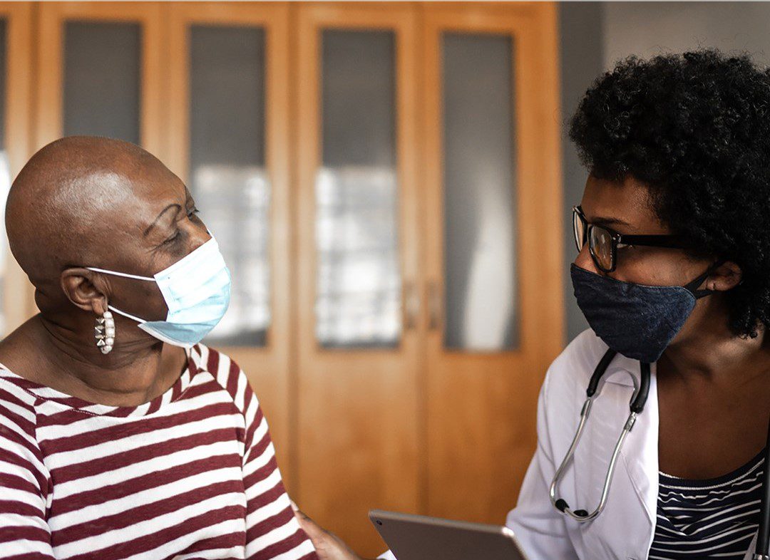 Patient and doctor wearing masks