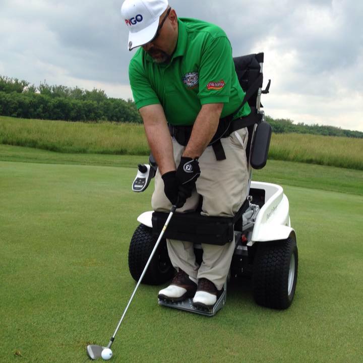 Fairways for warriors golf team member using adaptive golfing chair and equipment