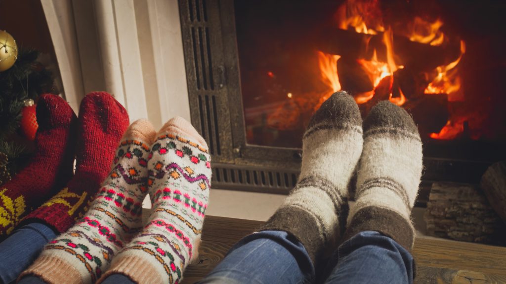 Holiday socks near fireplace