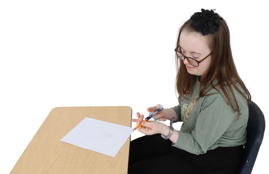 student using pencil sleeve