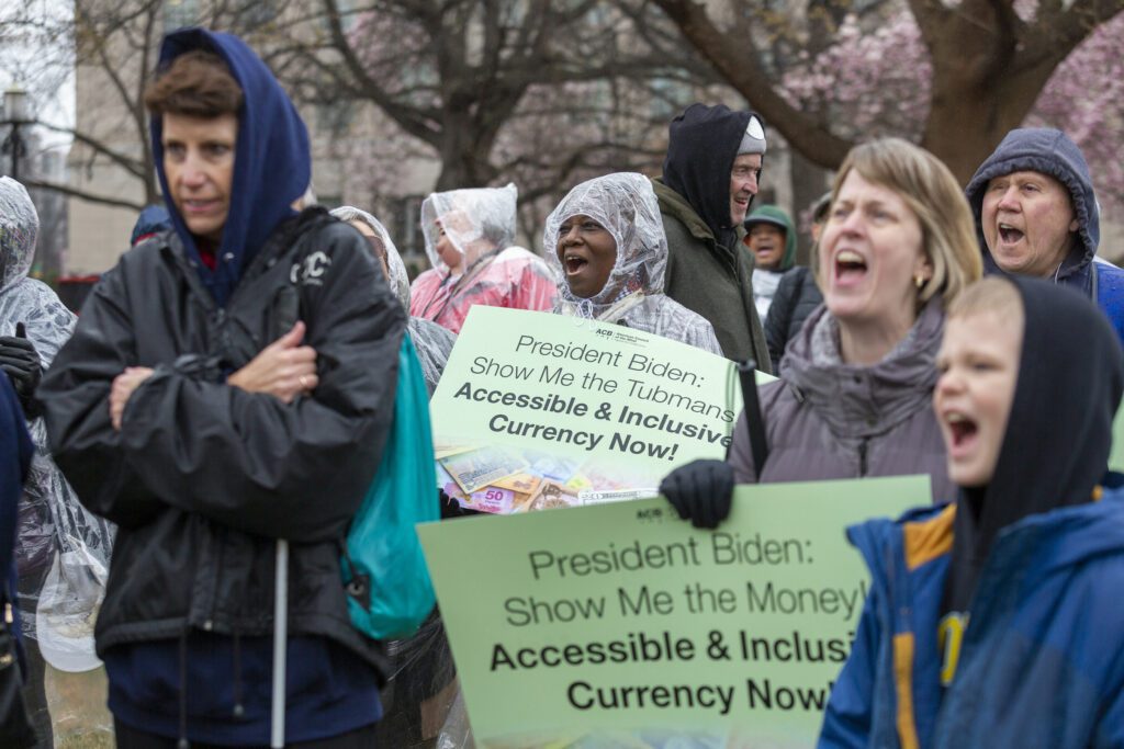 Disability activists rally for U.S. money to be resigned for accessibility.